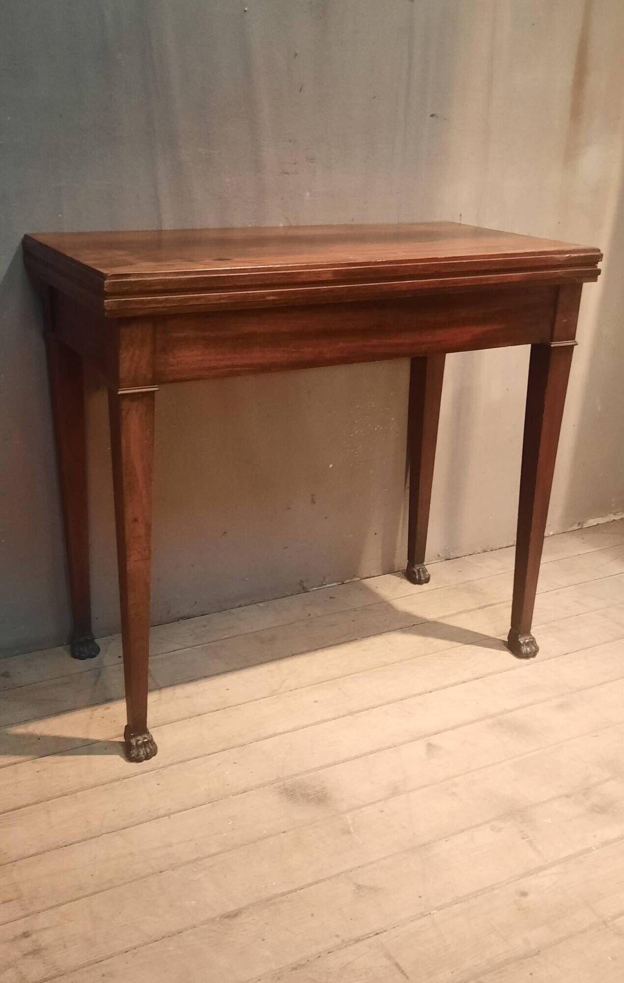 Rectangular console that transforms into a game table.