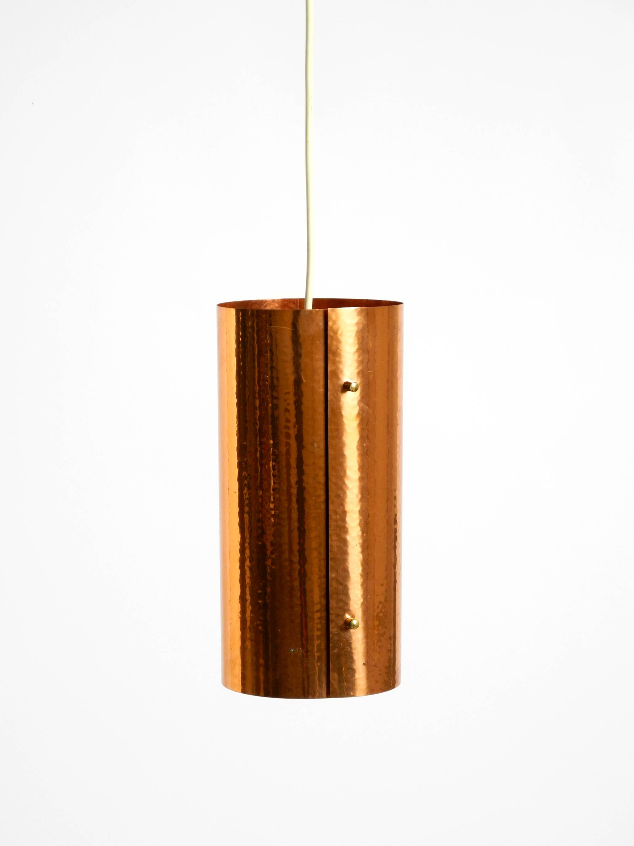 Two 50s tube pendant lamps consisting of two screwed-together copper bowls