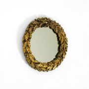 Beautiful small French mid-century wall mirror with an ornate brass frame