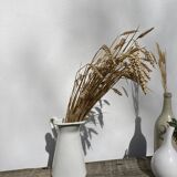 Old white enamelled metal pitcher