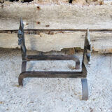 Old chenets fleur de lys in wrought iron