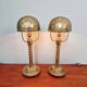 Pair of bronze and brass table lamps, early 20th century