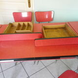 Table in red formica, 4 roc chairs, 2 extension cords, 2 drawers 60