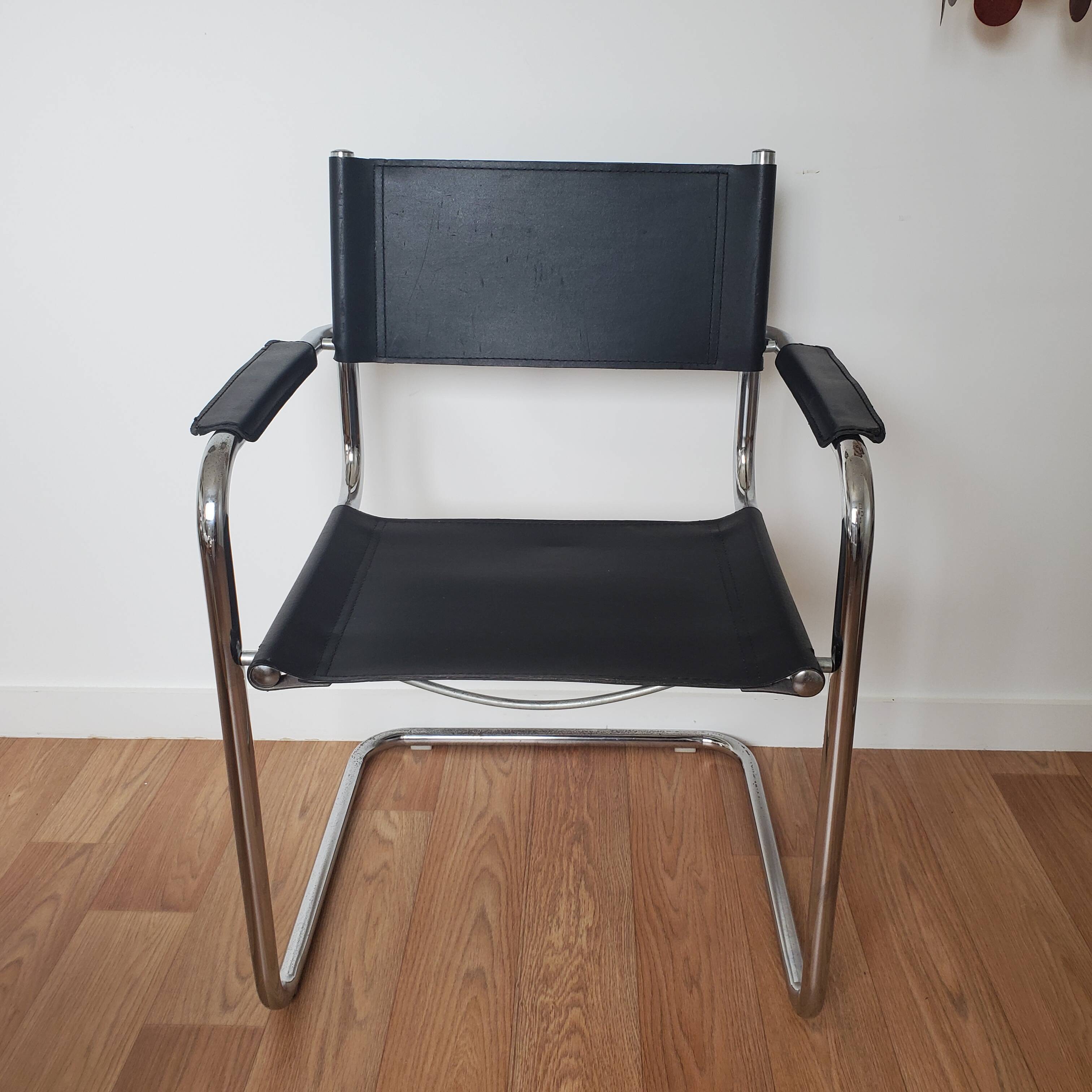 Pair of armchairs in chrome and black leather