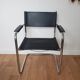 Pair of armchairs in chrome and black leather