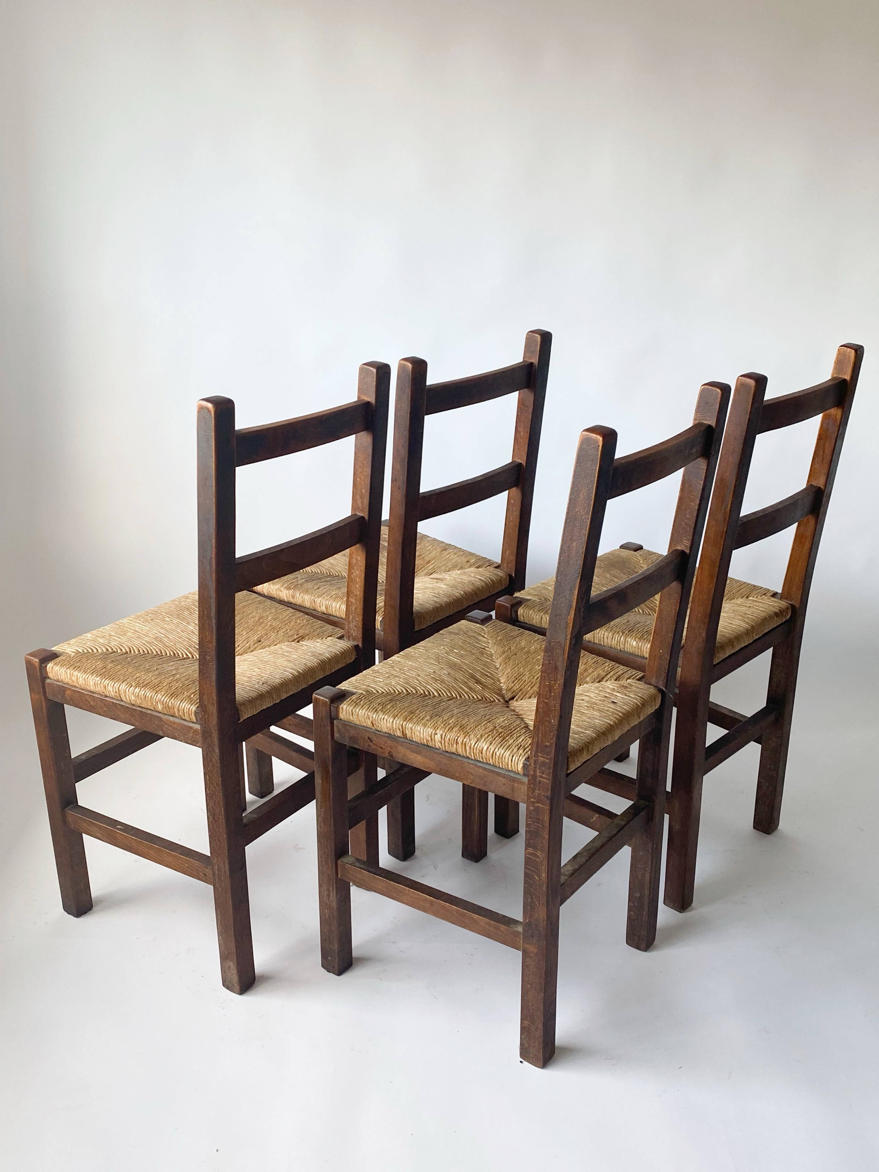 4 wooden and straw country chairs