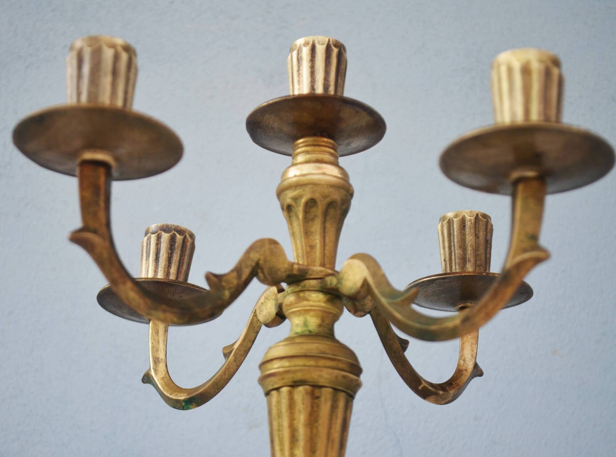 Solid brass candle holder with 5 candles and 4 arms