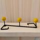 Twisted metal coat hook