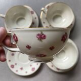 4 porcelain cups and saucers