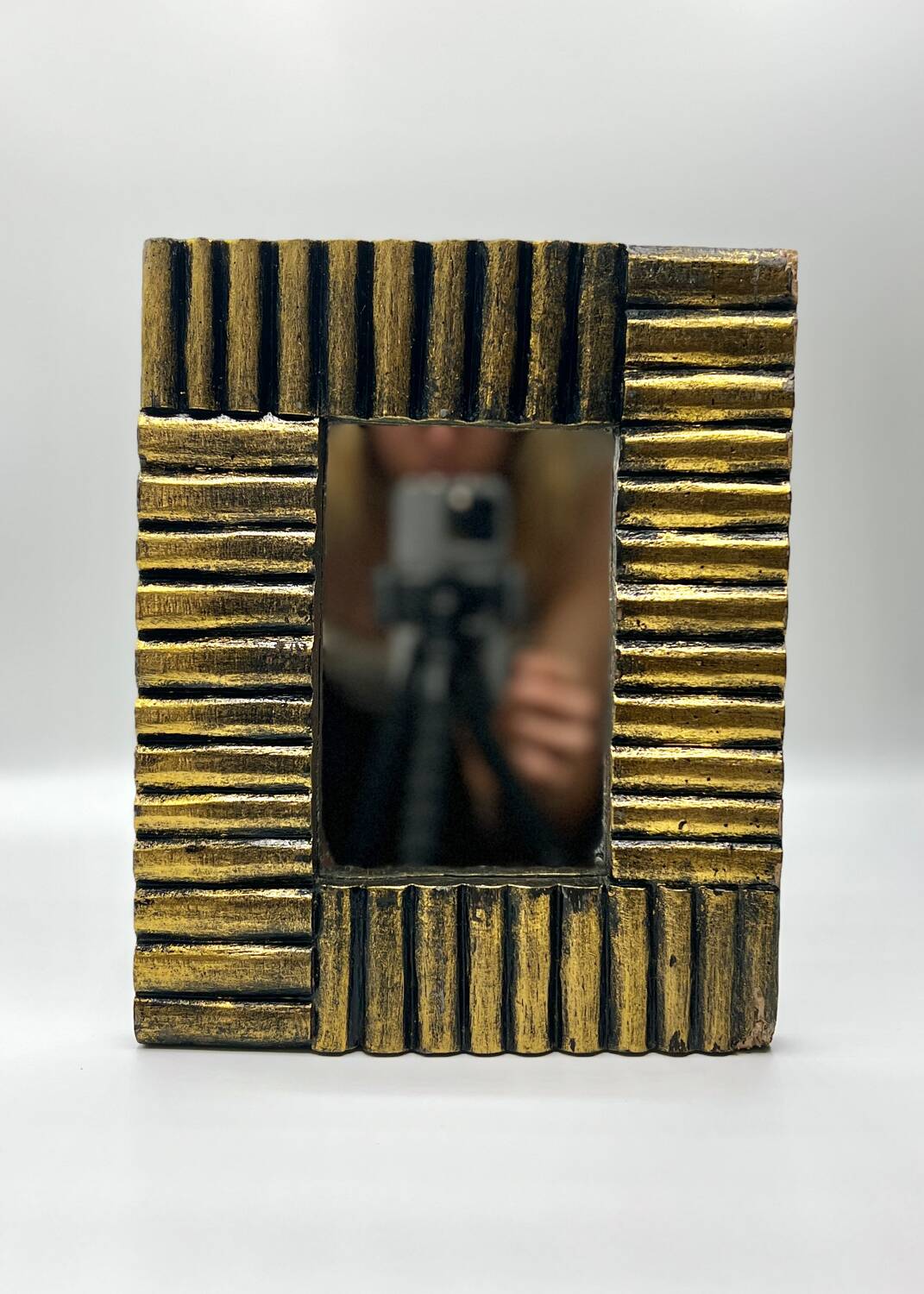 Art deco mirror in gilded wood
