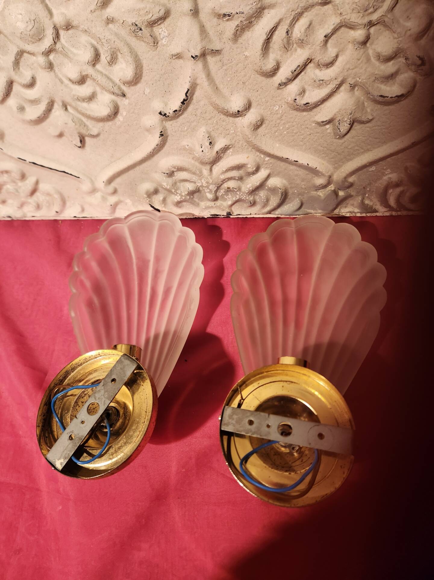 Pair of vintage brass wall lights with opaque glass shells