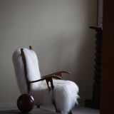 Henning Kjærnulf, armchair reupholstered in long-haired Icelandic sheepskin, 1950