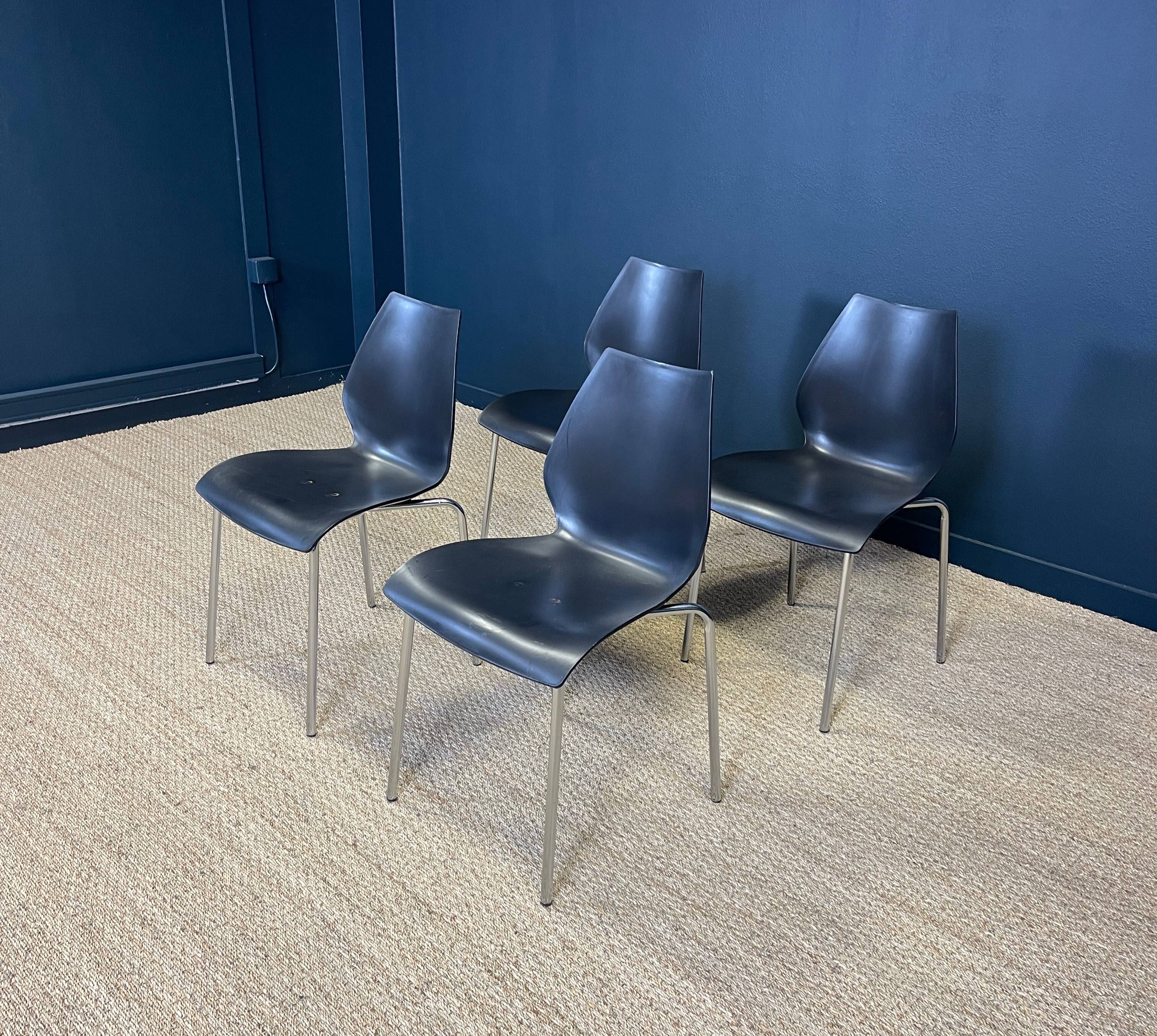 Set of 4 black dining room chairs from the 2000s