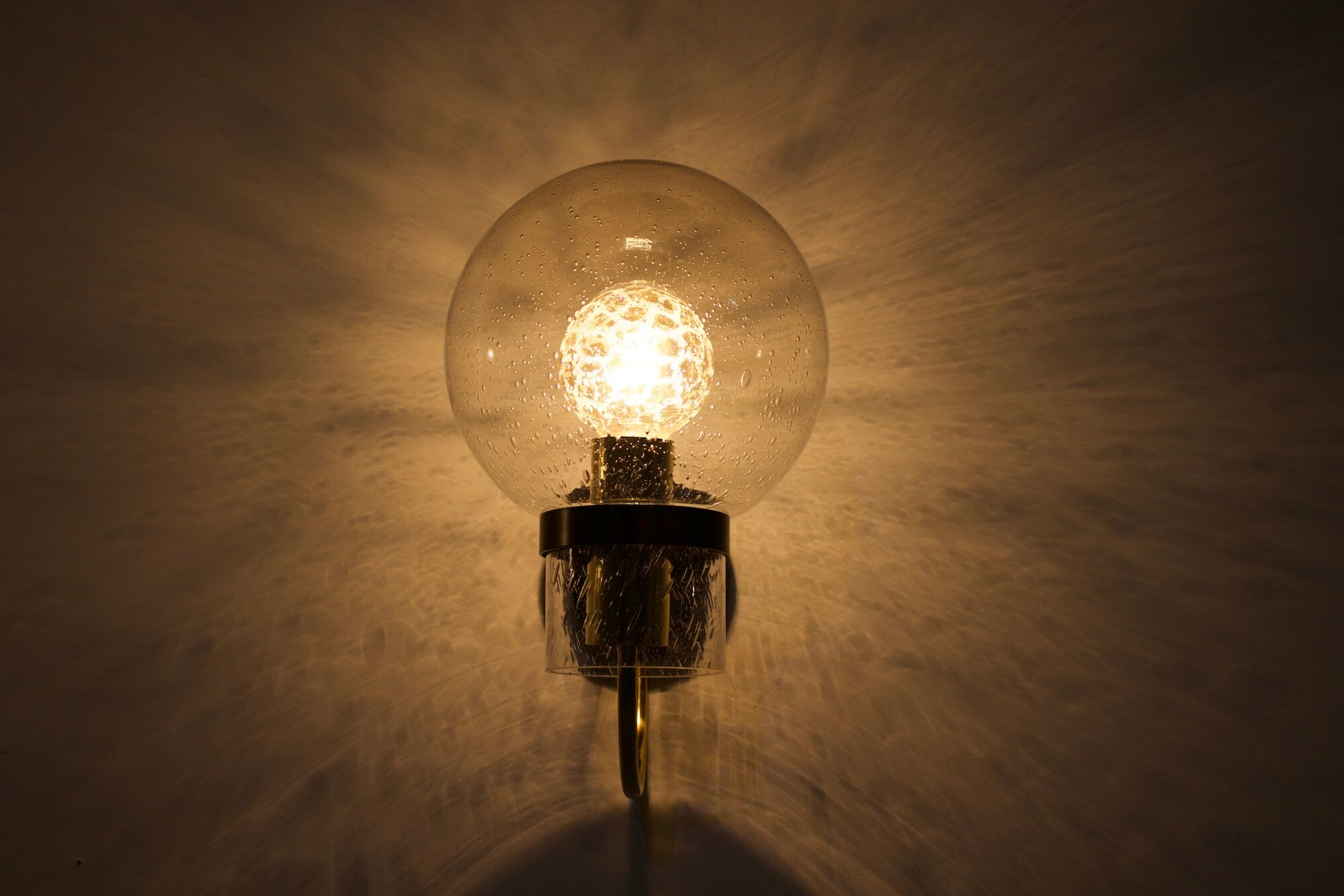 Wall lights with blown glass globes.