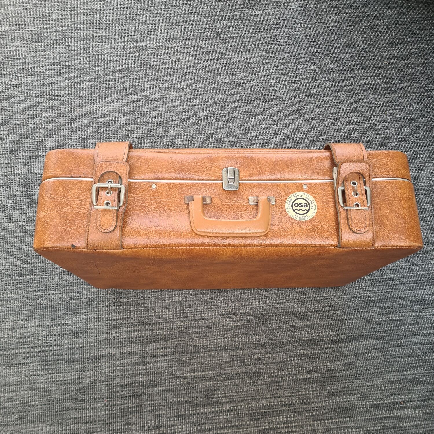 Old leatherette suitcase
