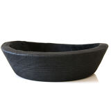 Cut / empty pocket in burning wood. shou-sugi-ban