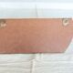 Vintage velvet coat rack with brass hooks