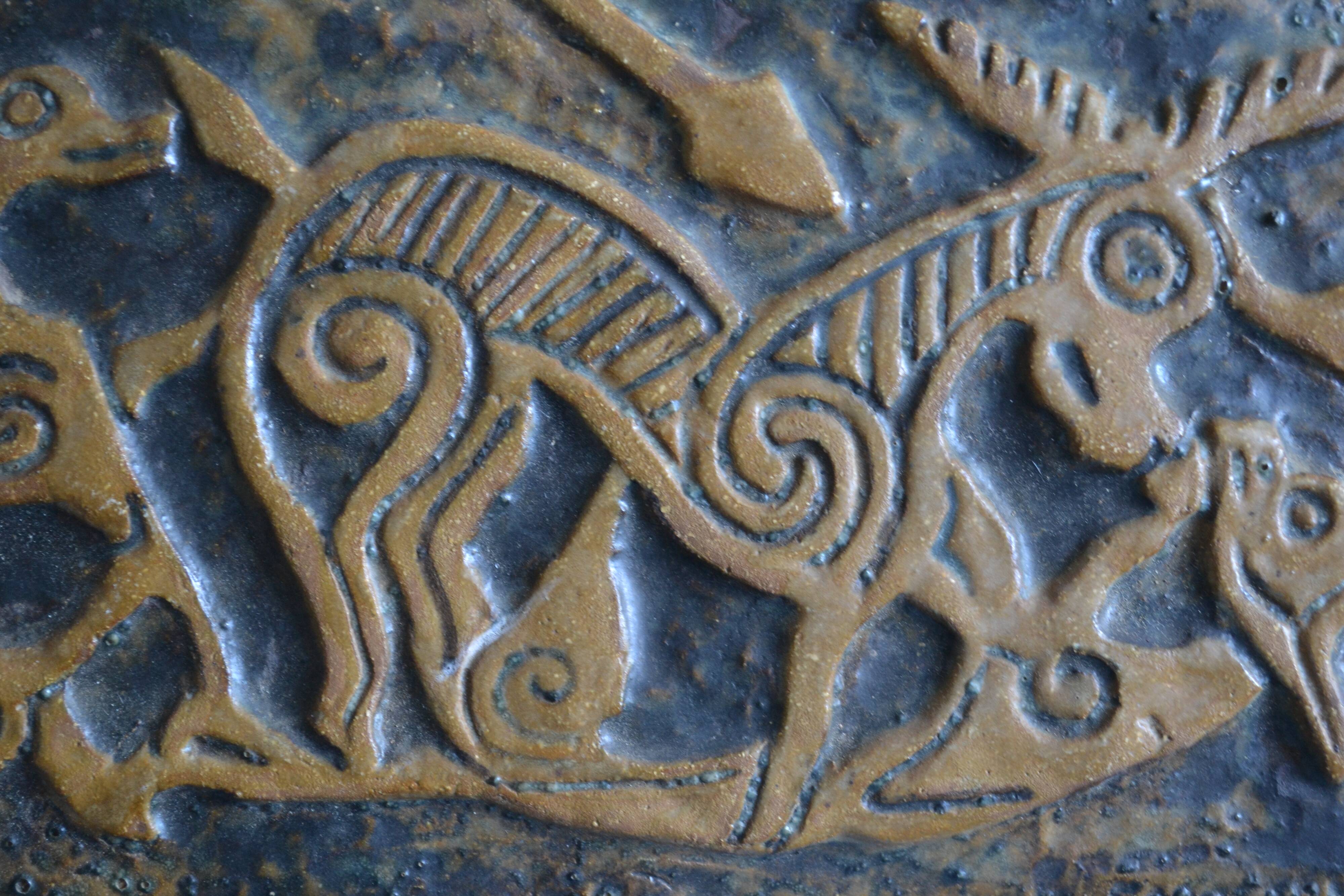 Bas-relief sculpture in terracotta inspired by the Celtic bestiary