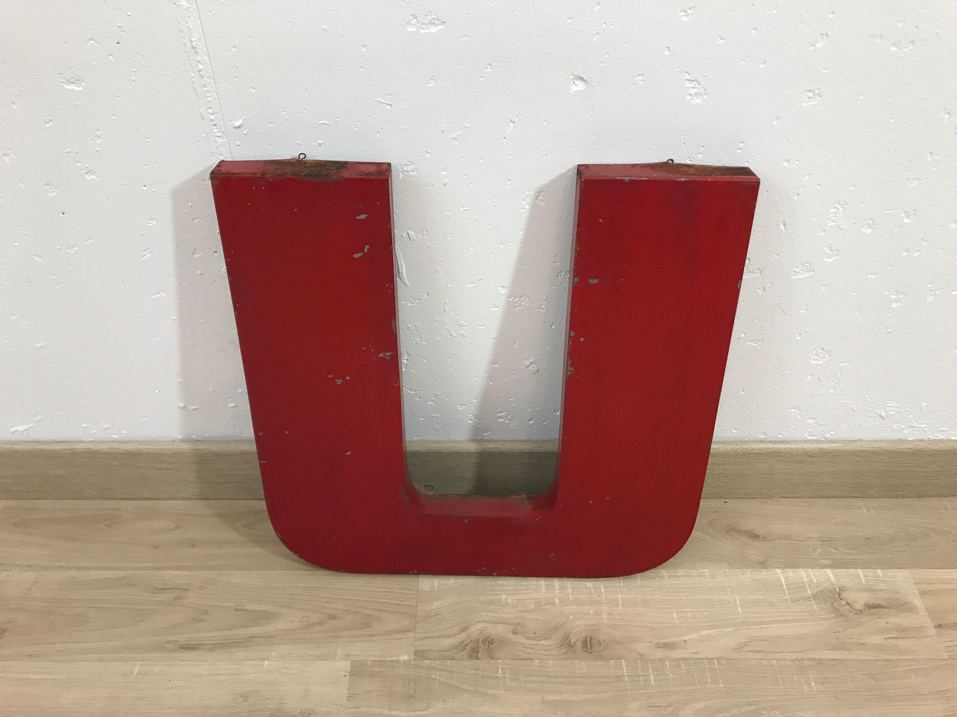 Old metal letter "U"