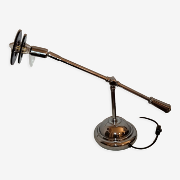 Articulated chromed metal lamp