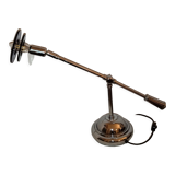 Articulated chromed metal lamp
