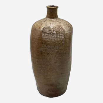 Engraved and square stoneware bottle