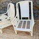Pair of white rattan armchairs
