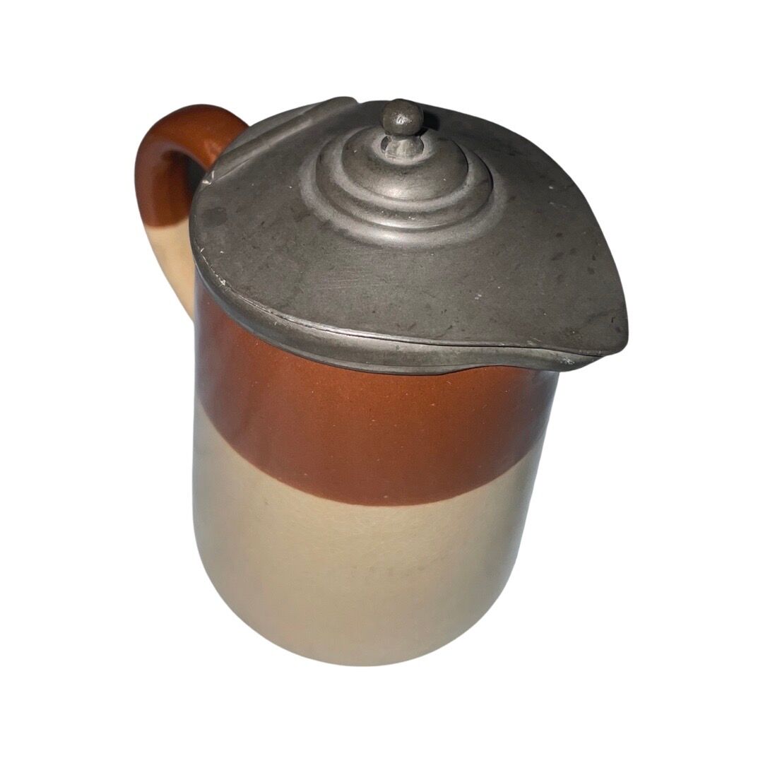 Small beige brown English earthenware milk jug