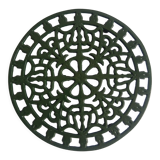 Vintage green cast iron trivet
