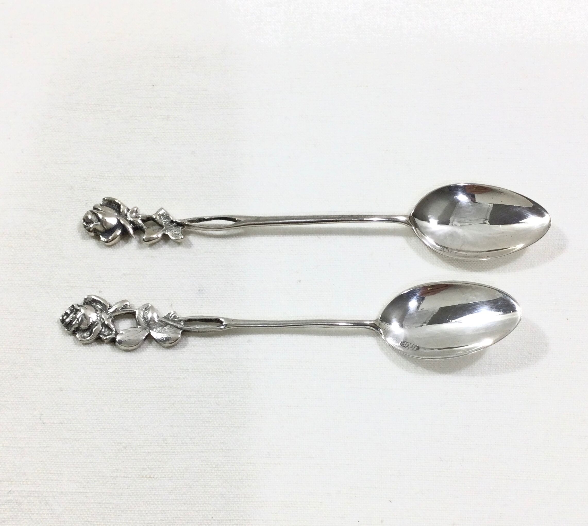 Set of 8 art nouveau silver spoons