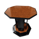 Octagonal dining table by Paul Michel in elm burl and black lacquer.
