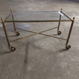 Rolling coffee table in vintage gilded bronze