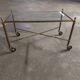 Rolling coffee table in vintage gilded bronze