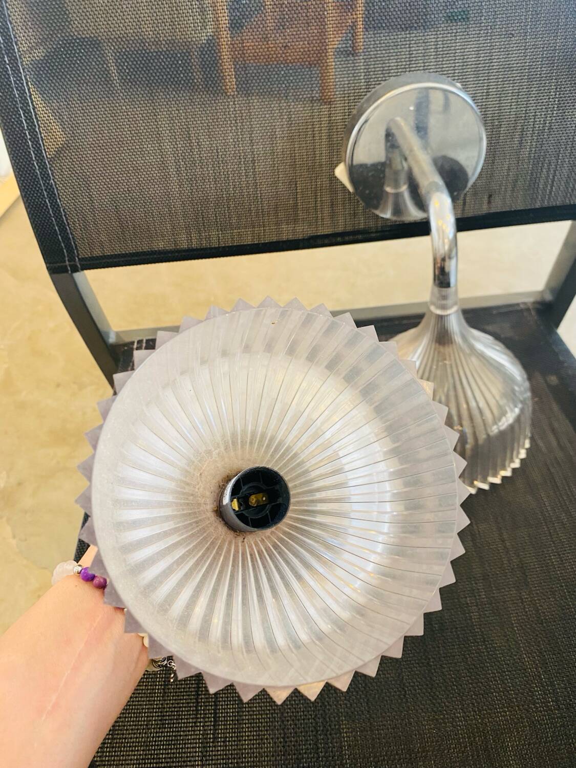 Many Kartell wall lamps.