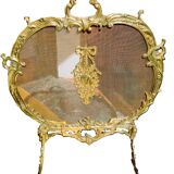 Fire screen, 19th century spark screen in gilded bronze