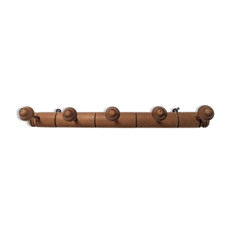 Turned wood coat rack