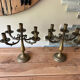 Pair of large 5-light candlesticks in patinated brass, classical style.