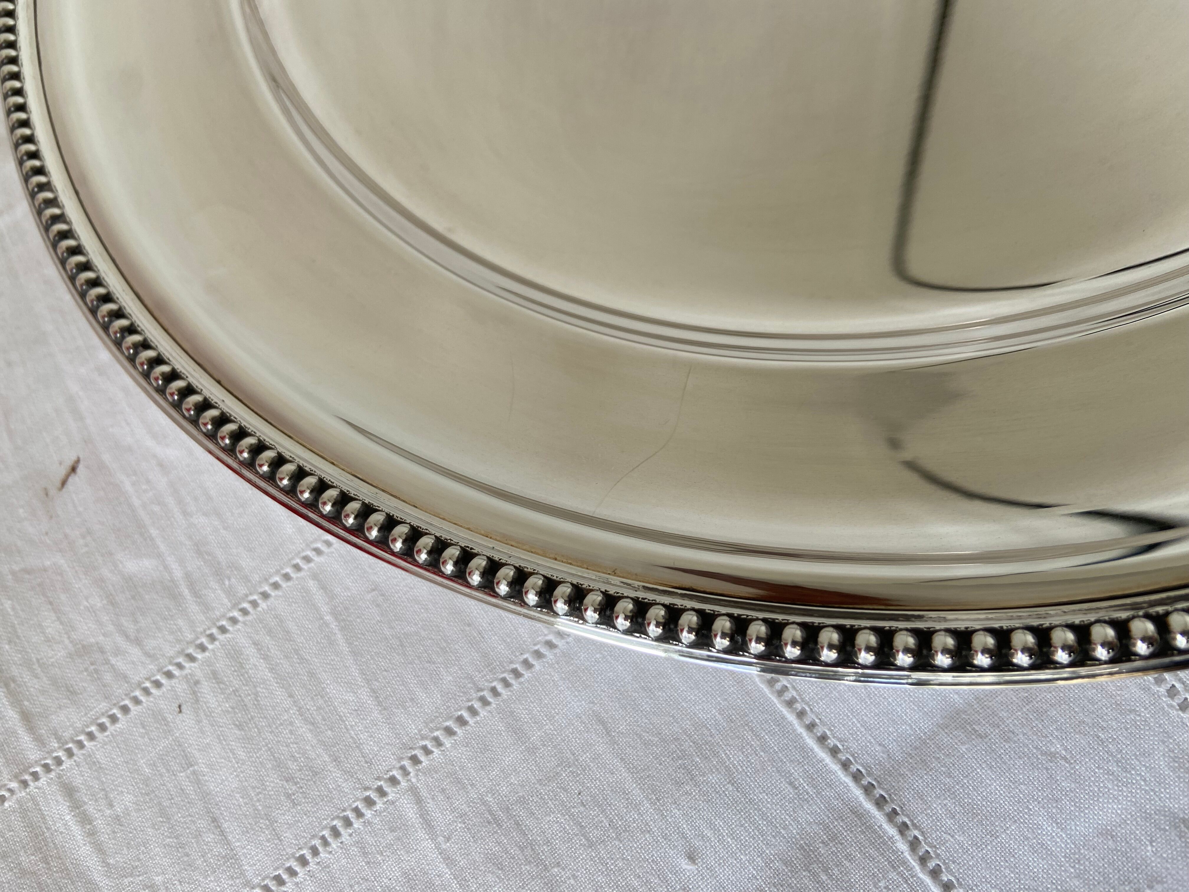 New round silver plated dish