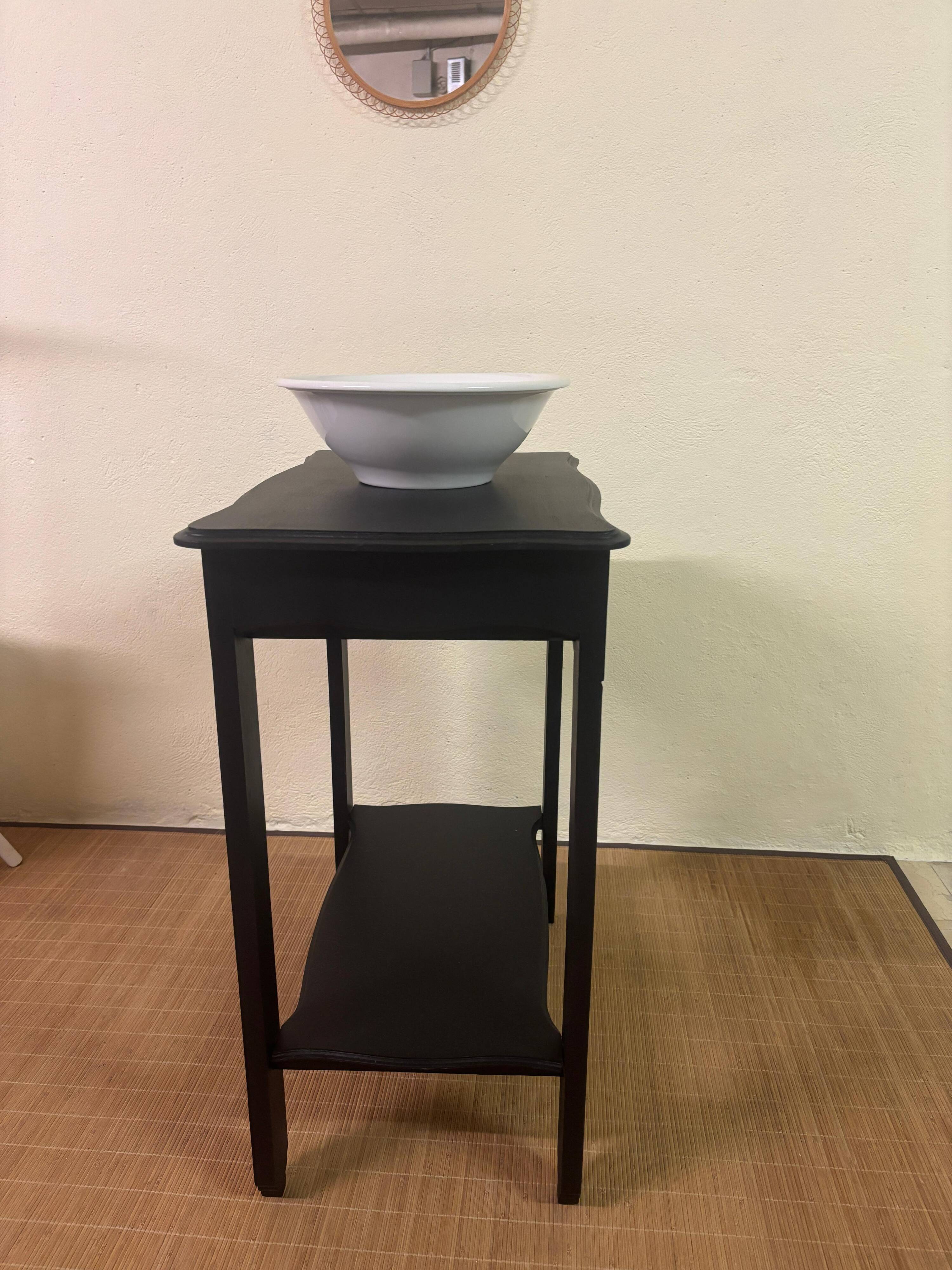 Small Art Deco console reinterpreted – matte black wood with drawer