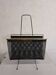 Vintage gold magazine rack from the 1960s.