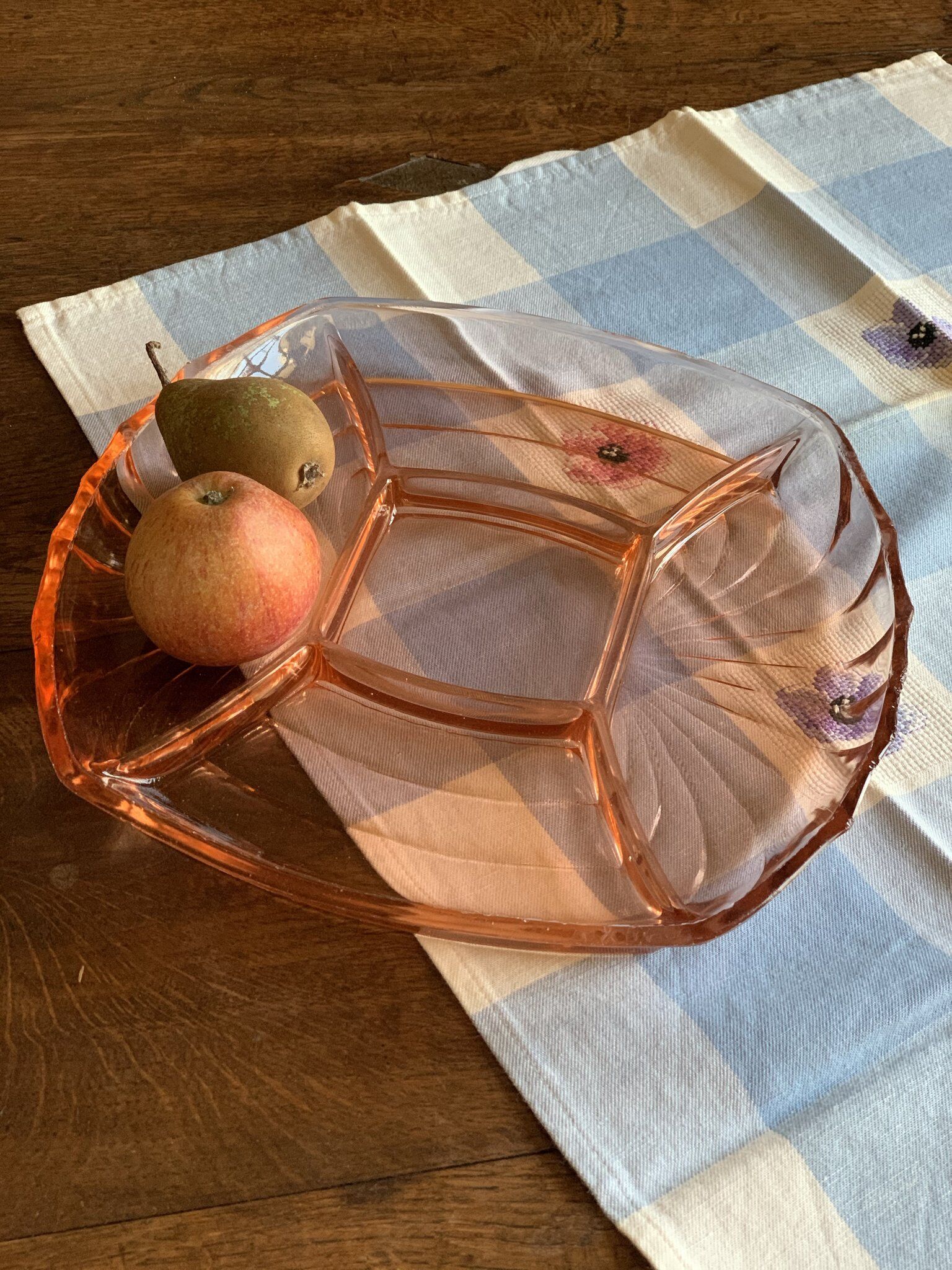 Antique dish with hors d'oeuvre in rosaline glass