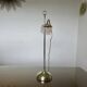 Art Nouveau jeweler's lamp in bronze and glass paste tulip