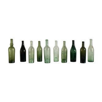 Série de dix bouteilles anciennes