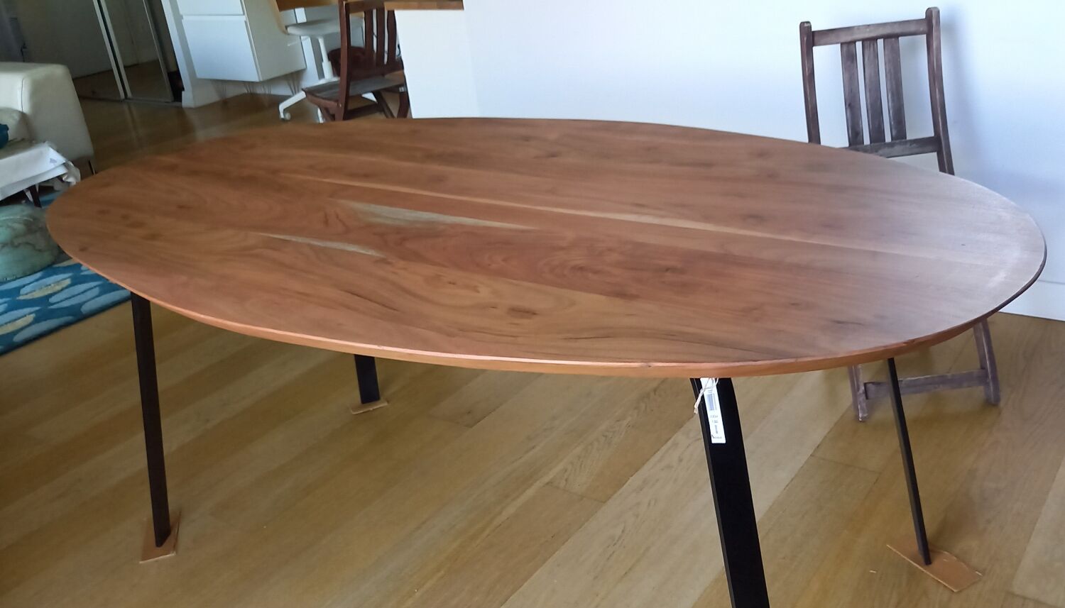 Oval solid wood and metal table