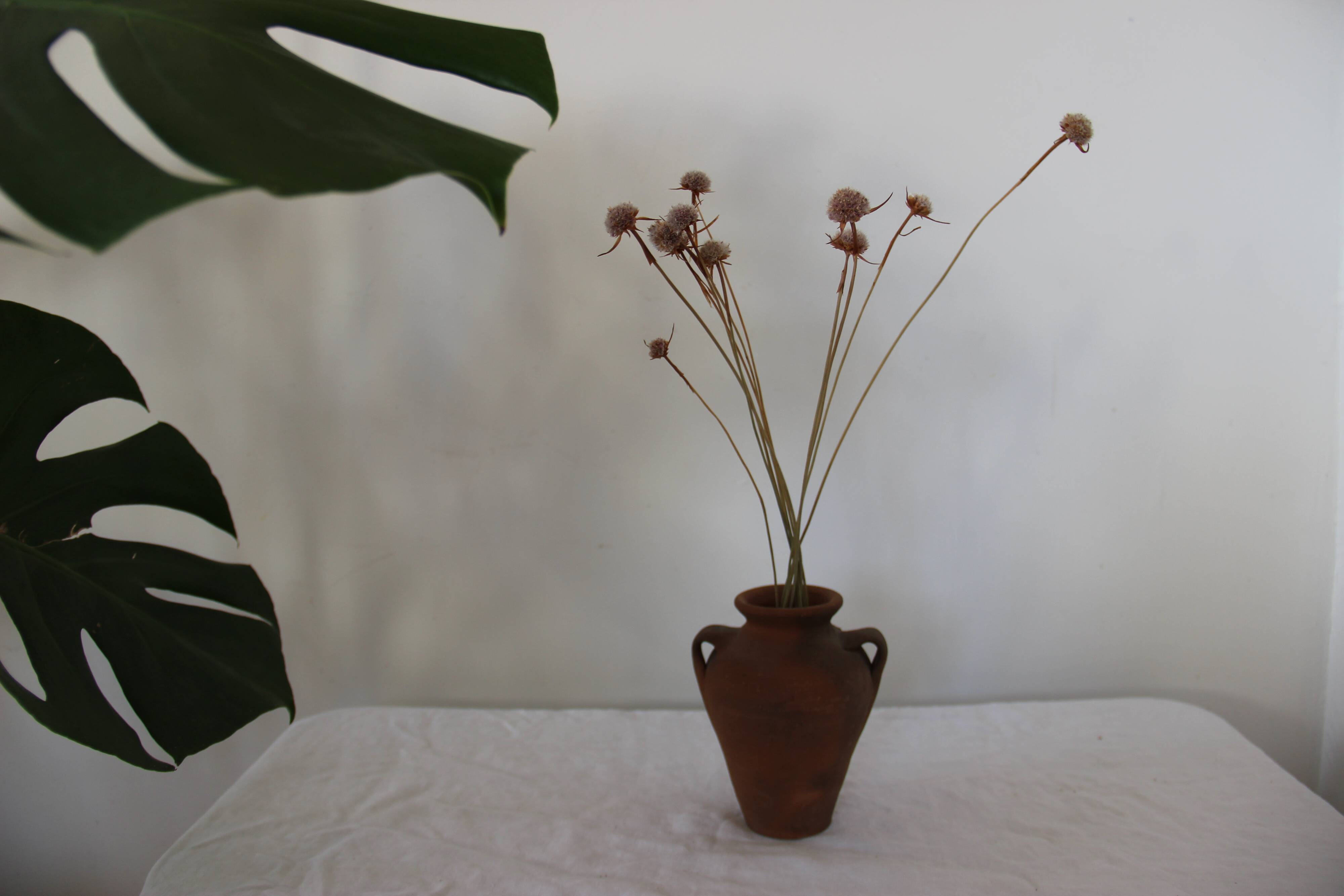 Old little terracotta jar