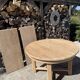 Round solid oak table with extensions, maximum 220cm.