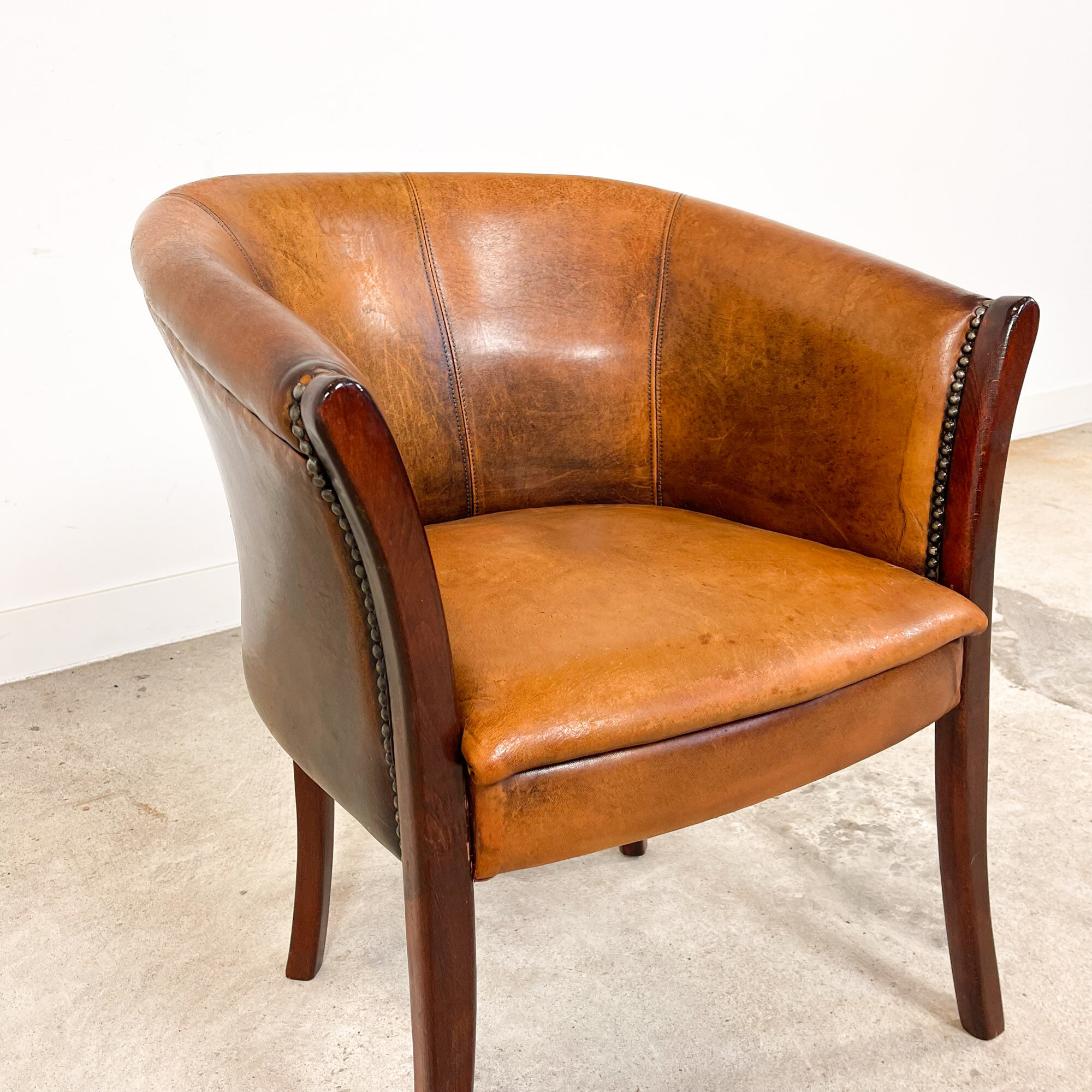 Vintage sheep leather club chair high tub Enschede