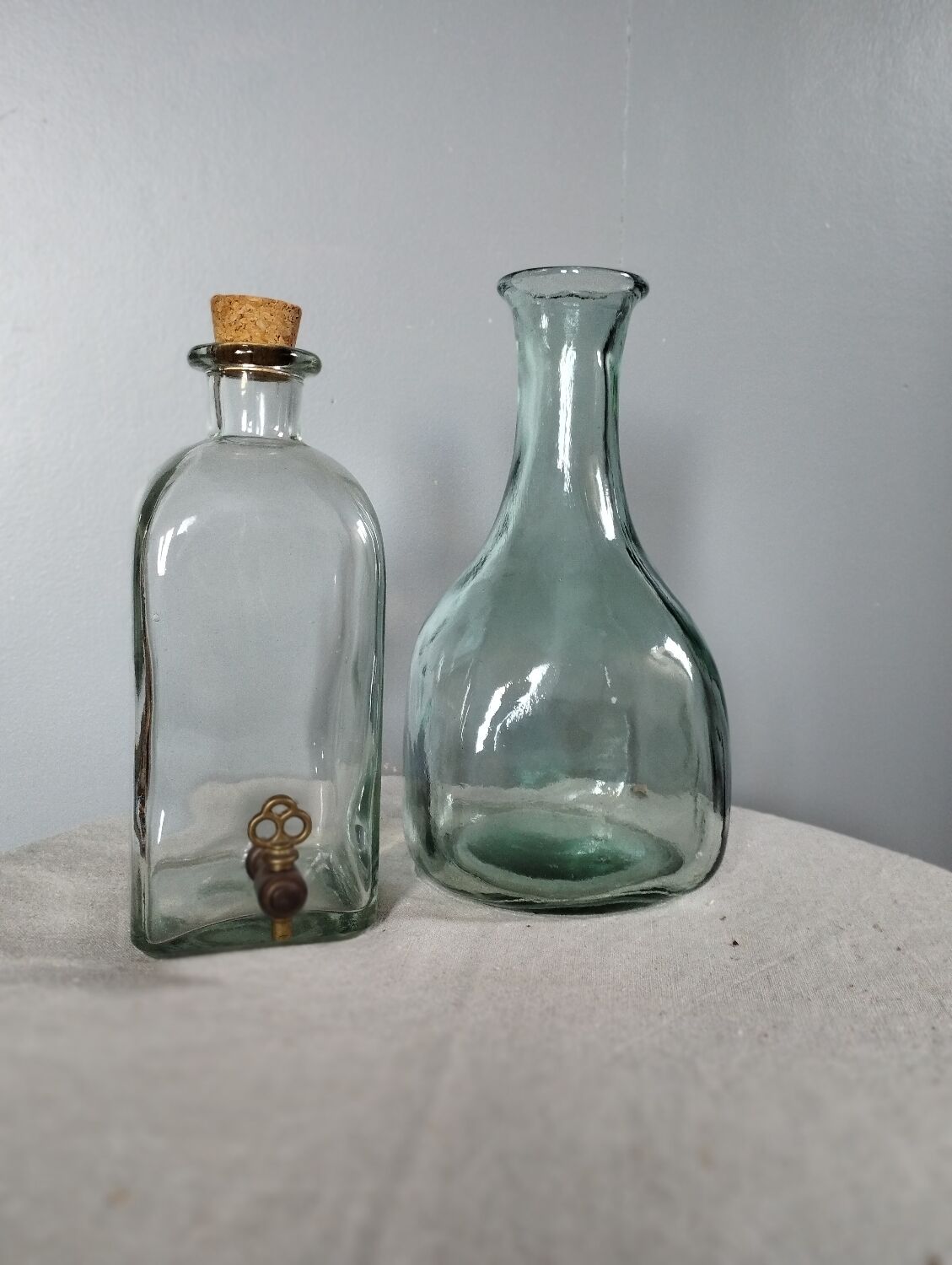 Duo of bottles/carafes, vintage