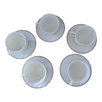 5 white and golden arcopal cups