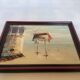 Small marine painting of a boat in oil on panel.